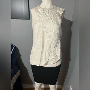 Sleeveless Cream Ruffle-Accent Blouse